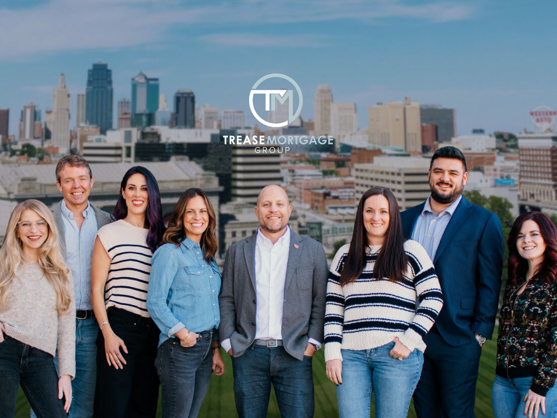 Trease Group Team Photo on Balcony